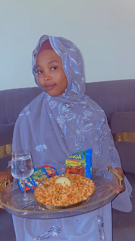 Umaima with Jollof macaroni